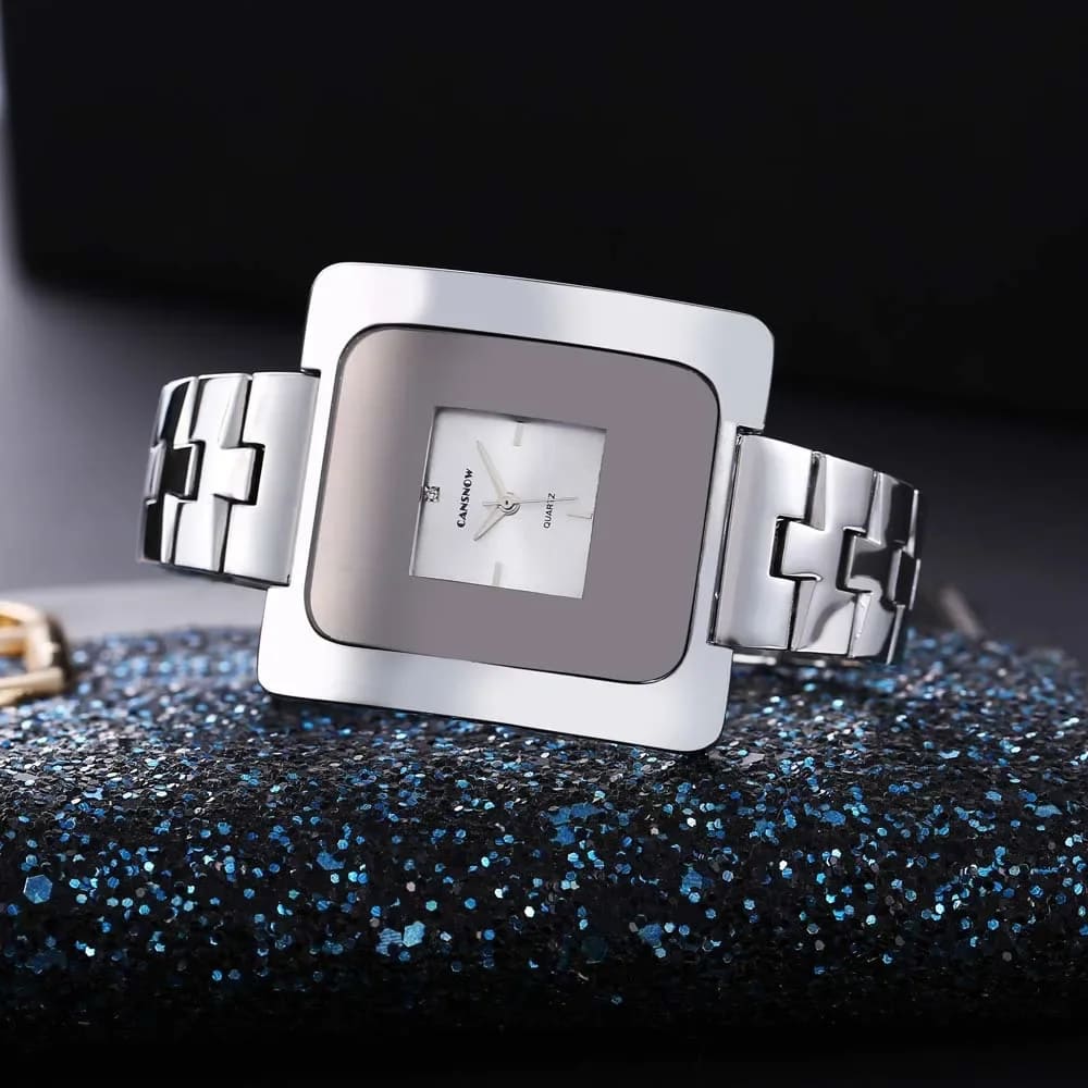 SET TESORO ANDINO: RELOJ INTI + BILLETERA FLOR ANDINA